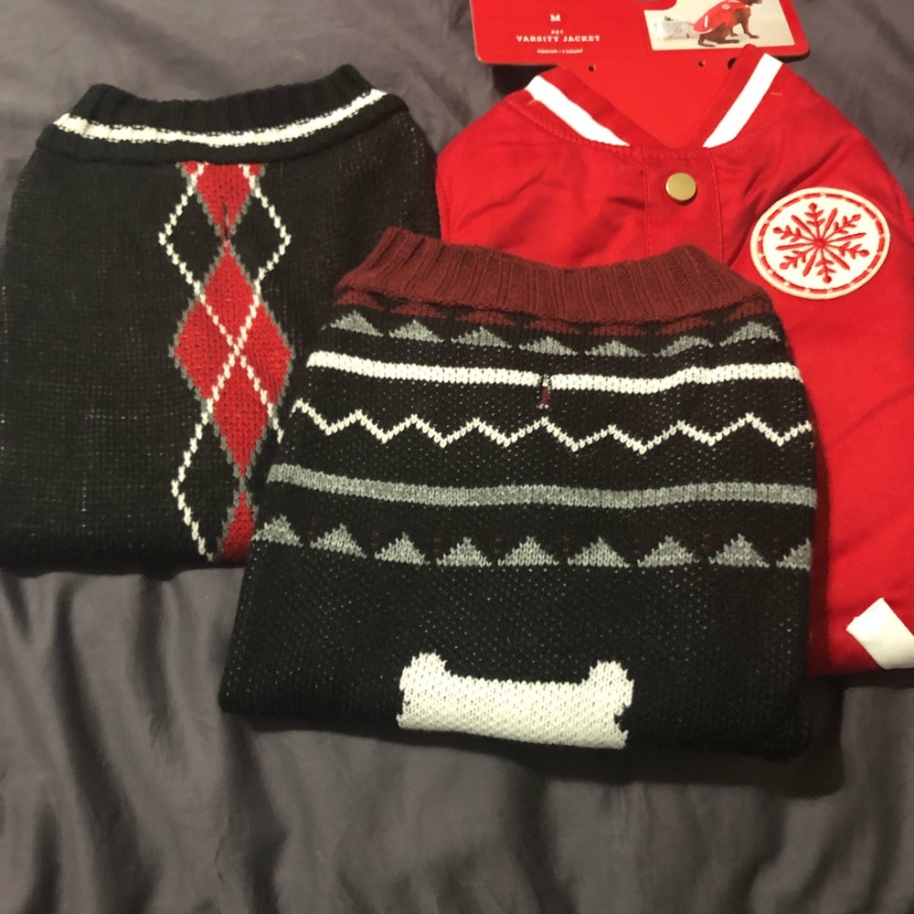 3 Dog clothing items; winter coat and 2 sweaters.